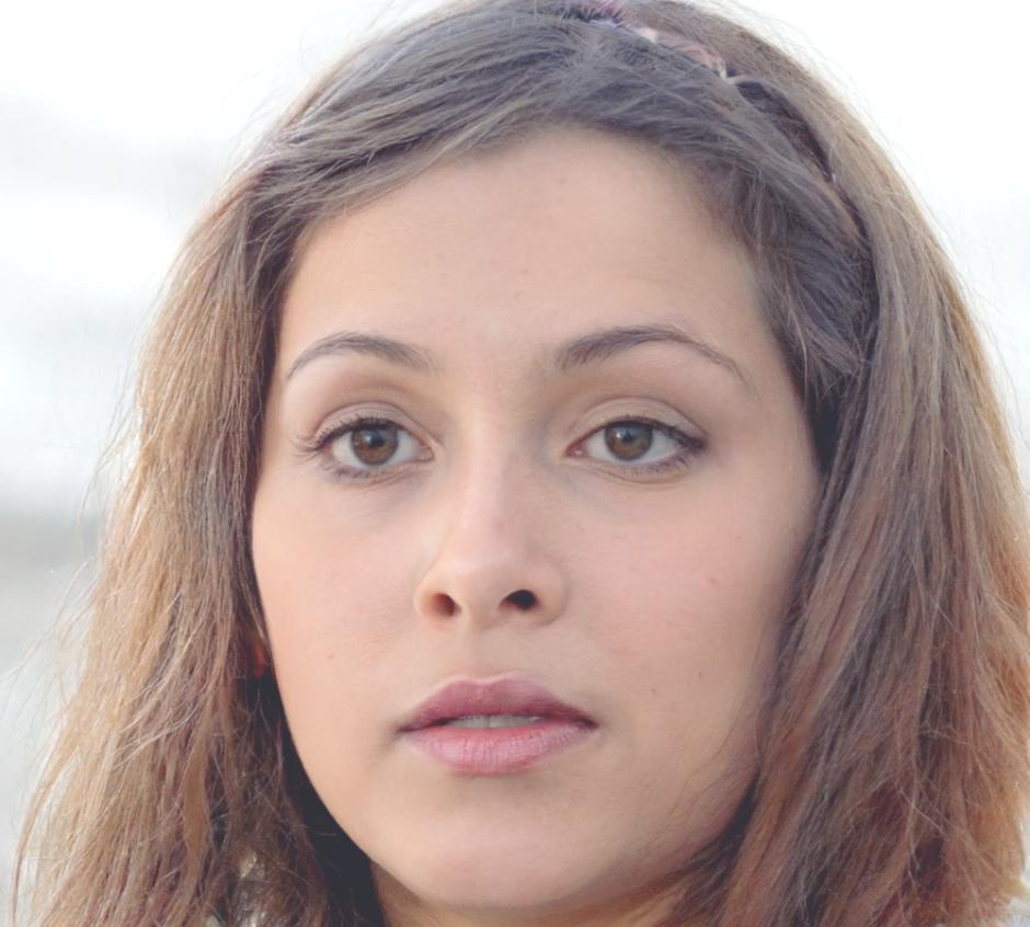 Professional headshot of senior investment research analyst